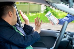 Driver refusing a breathalyzer test when stopped on suspicion of a driving while intoxicated (DWI).